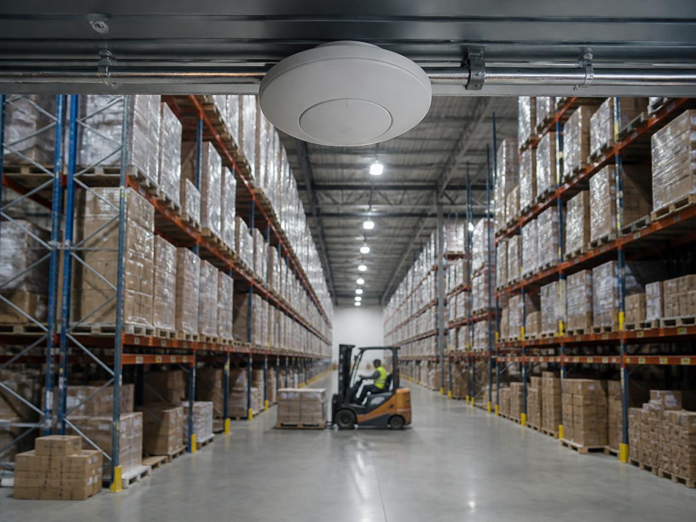 Ceiling dome antenna installed in a distribution warehouse